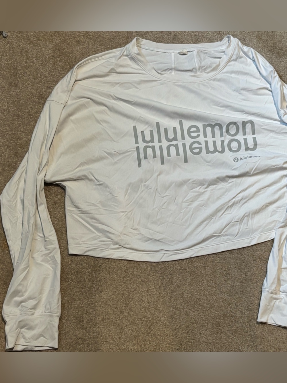 Lululemon women’s size 12 cropped white long sleeve